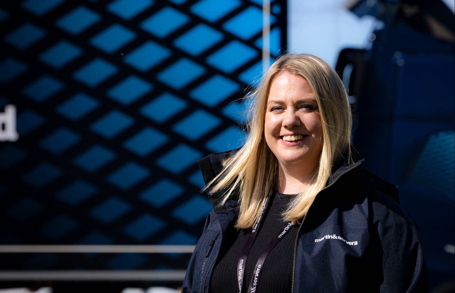 Worker in front of DFDS electric truck
