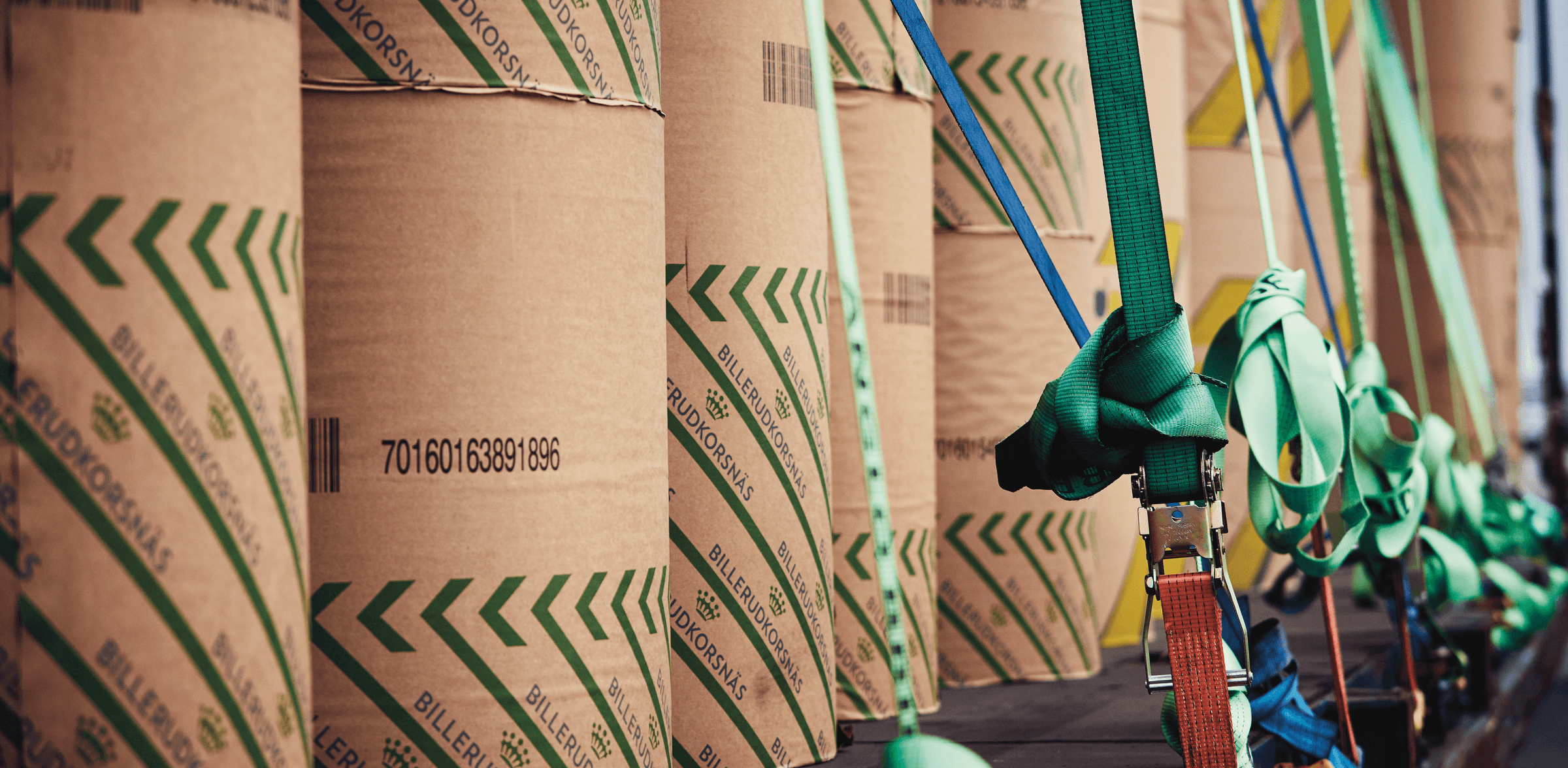 Forest products stacked and secured on a truck for DFDS Logistics