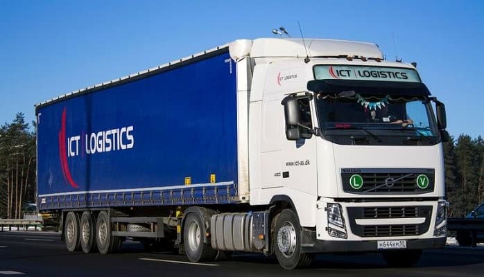 The truck driving on the road