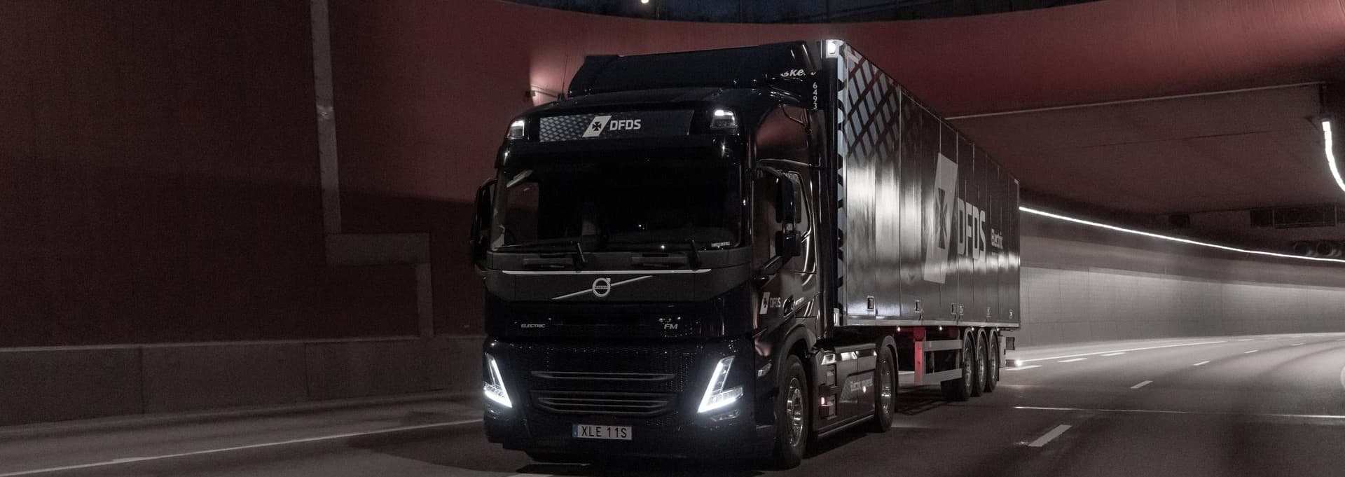 DFDS Electric truck driving at night.